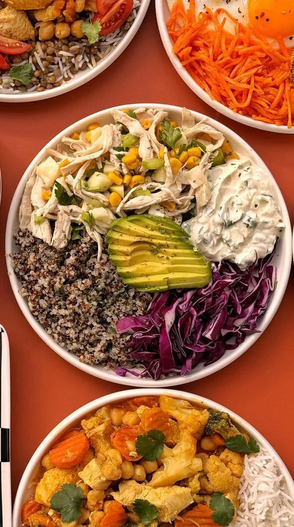 Bowl with quinoa, chicken salad and avocado