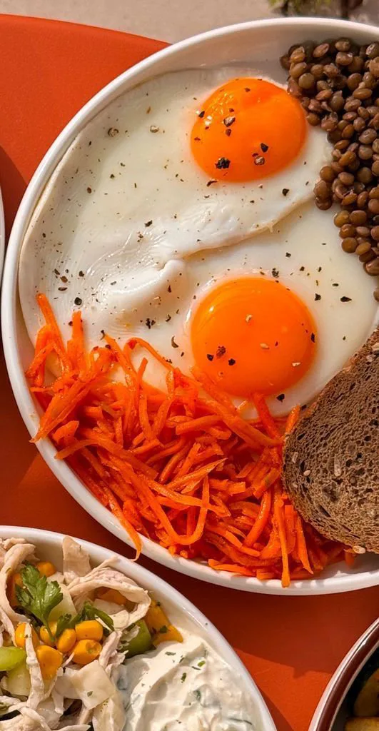 Fried eggs with lentils and Korean carrots