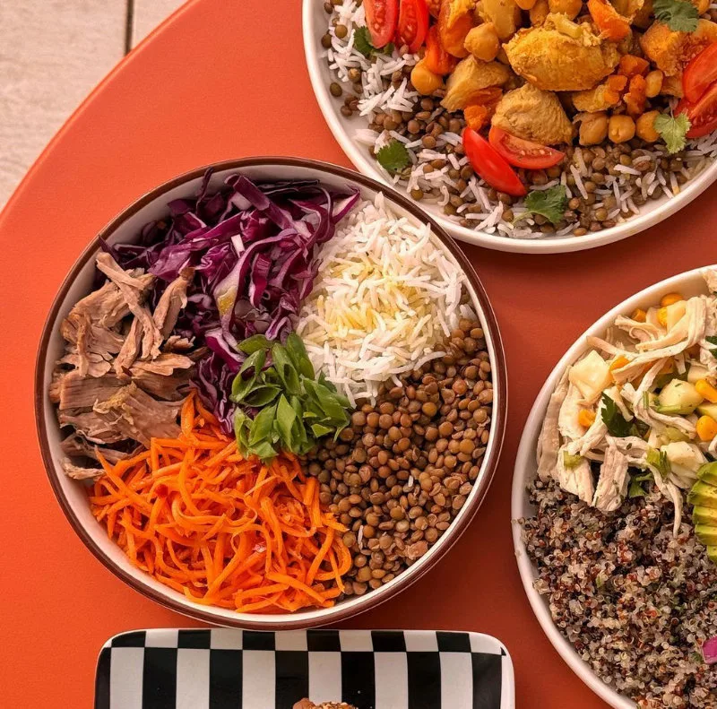 Bowl with lentils, rice and pork