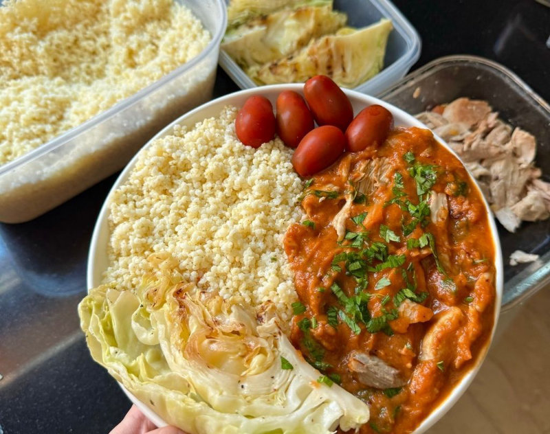 Millet with turkey in tomato sauce and cabbage steak