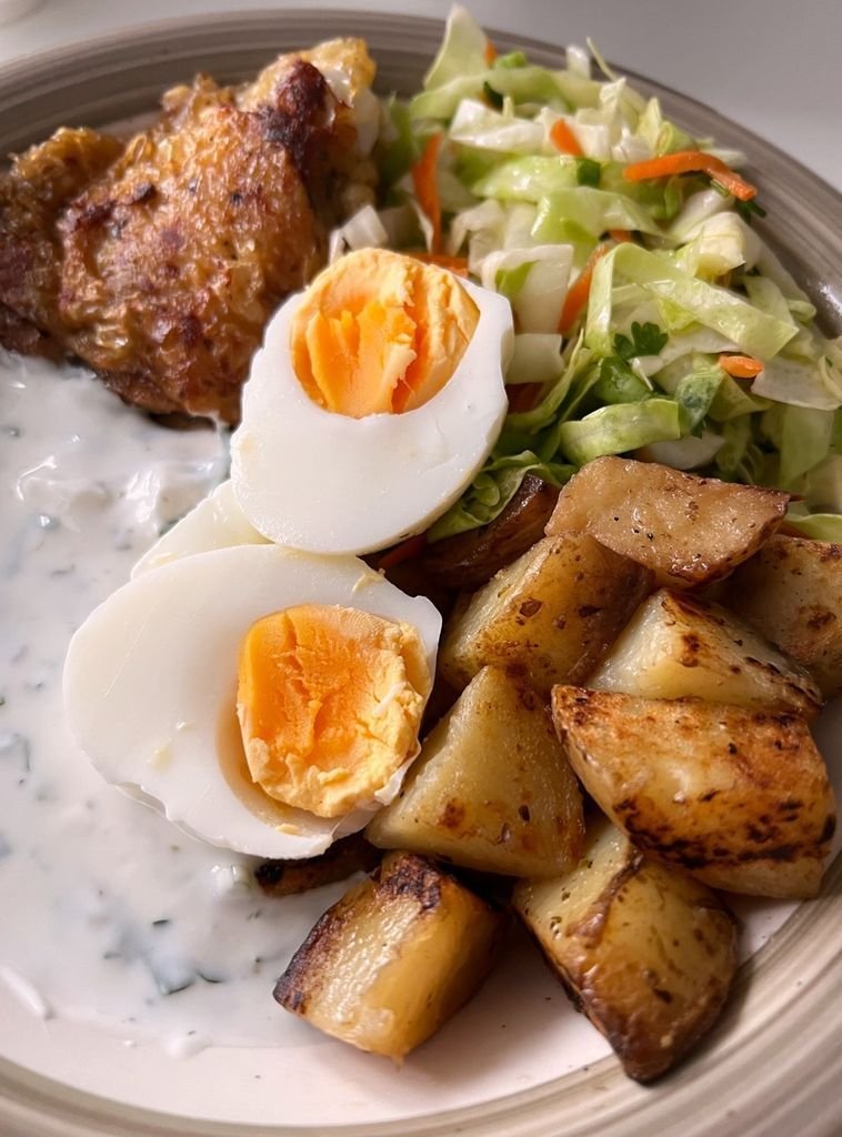 Stewed potatoes with chicken and cabbage salad