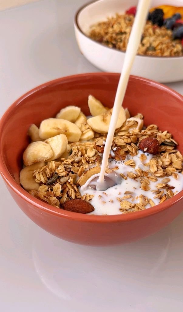 Granola with milk, banana and nut butter
